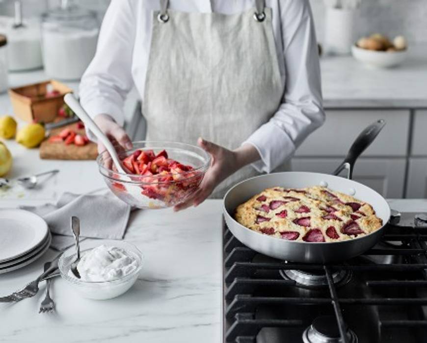 A chef preparing a skillet strawberry shortcake in the GreenPan Venice Pro Ceramic Nonstick 11