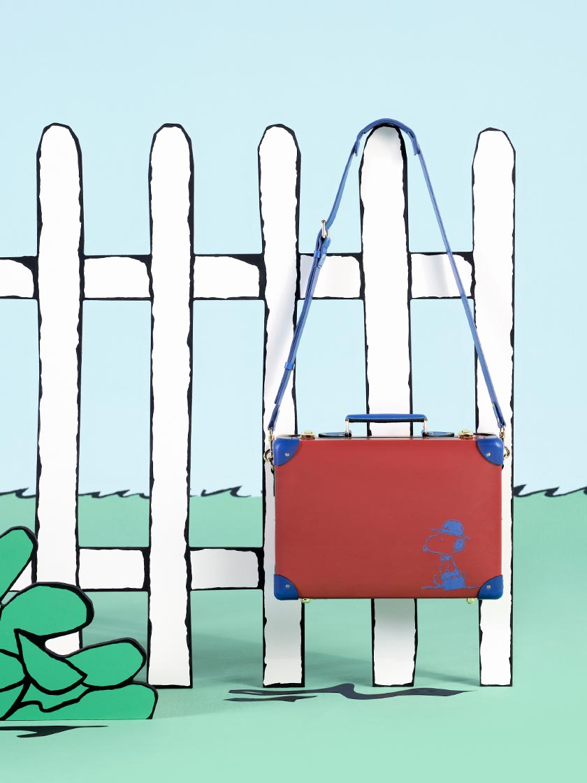 Globe-Trotter x PEANUTS Collaboration. Small Attaché (Briefcase) Featuring Snoopy in Doghouse Red and Cobalt Blue.