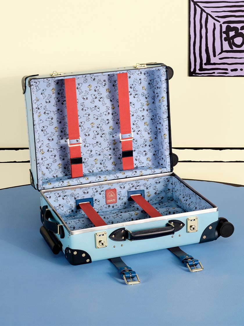 Globe-Trotter x PEANUTS Collaboration. Carry-On (Cabin) Suitcase With Four Wheels Featuring Snoopy in Linus Blue.