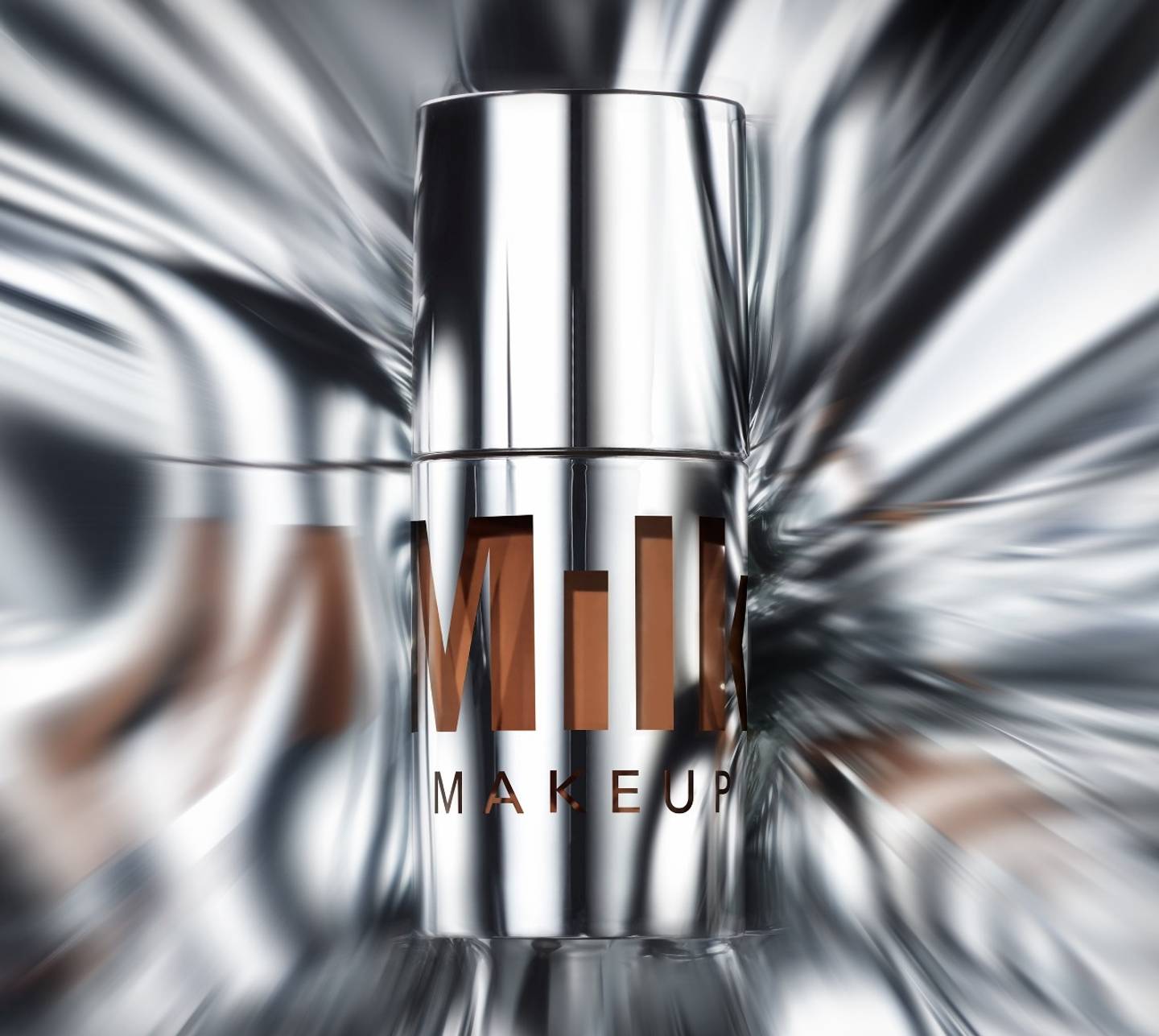 Milk Makeup Future Fluid All Over Cream Concealer on a futuristic silver background