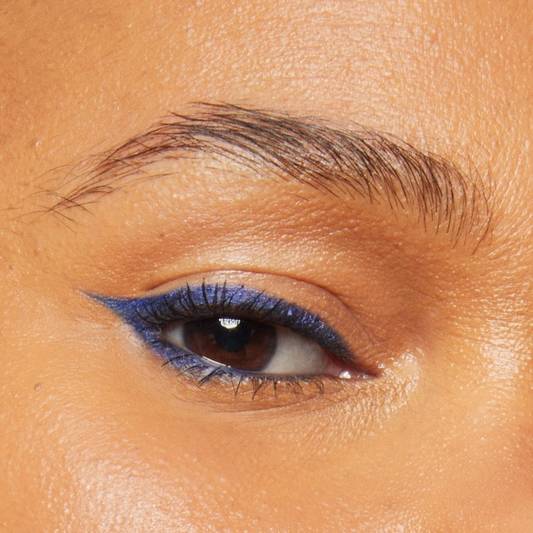 Close-up of model's eye wearing Milk Makeup Infinity Long Wear Eyeliner in Time