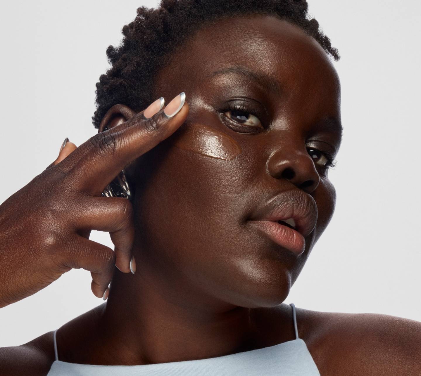 A model applied Hydro Grip Gel Tint Skin Tint