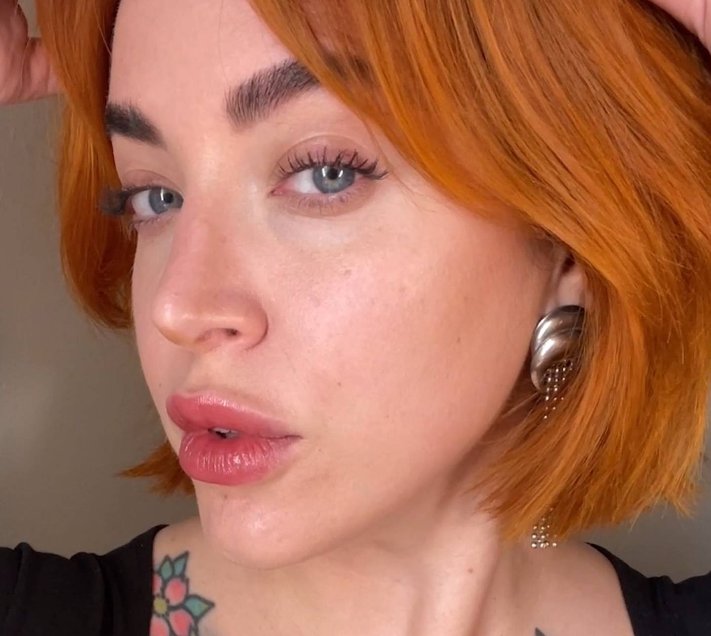 Milk Makeup Director of Artistry Sara Wren wears Milk Makeup Future Fluid All Over Cream Concealer