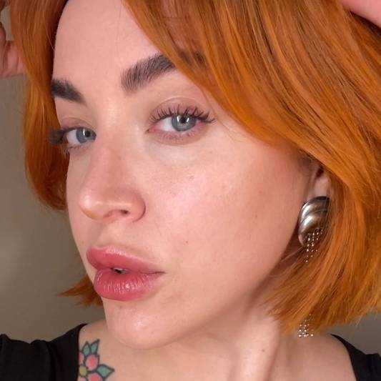 Milk Makeup Director of Artistry Sara Wren wears Milk Makeup Future Fluid All Over Cream Concealer