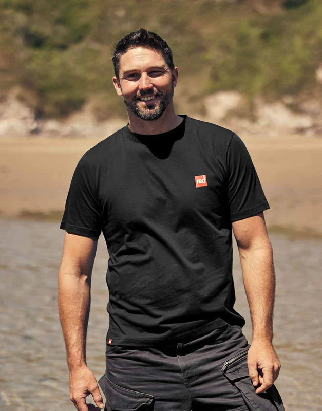 Man smiling wearing a Red Original Lifestyle T-shirt in Black
