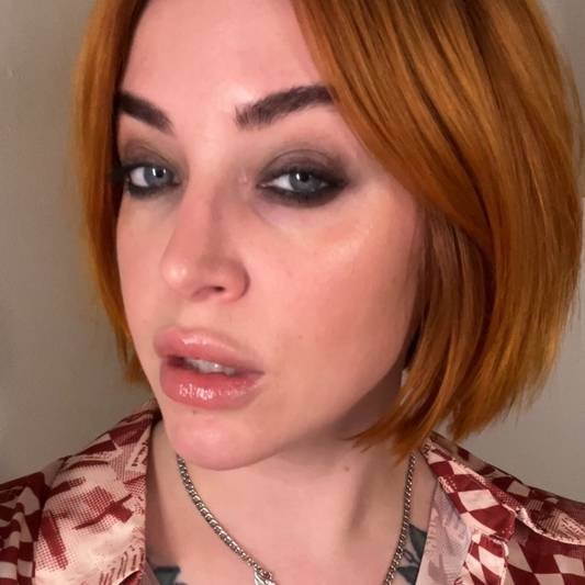 Portrait of Sara Wren wearing a full face of Milk Makeup Products to achieve the soft goth makeup trend