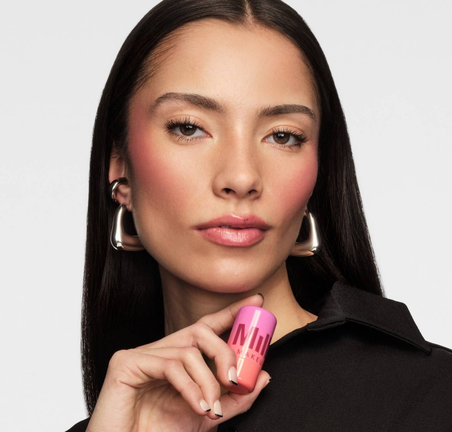 a model shows off the underpainting makeup trend