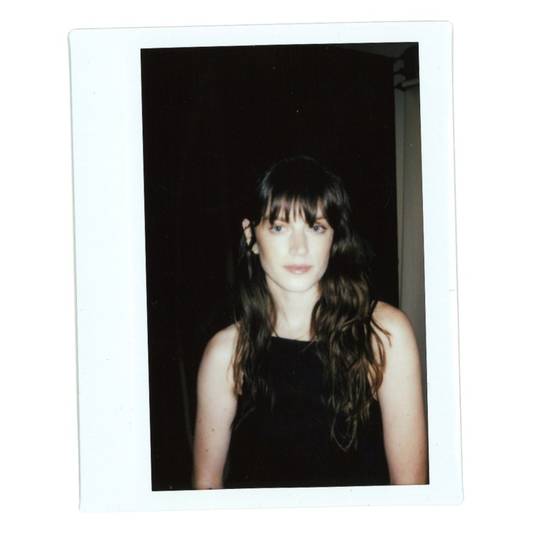 Polaroid of Milk Makeup model Bridie