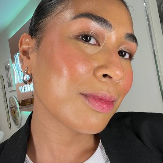 Selfie of a woman with a medium skin tone wearing Milk Makeup Lip + Cheek in Quickie