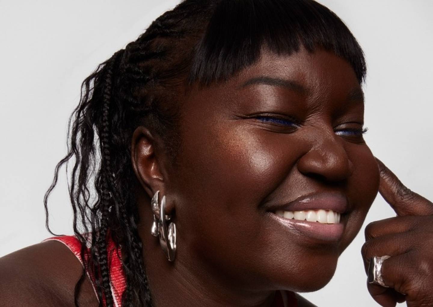 Model wears Milk Makeup Infinity Long Wear Eyeliner in Limitless as a lip liner on a white background