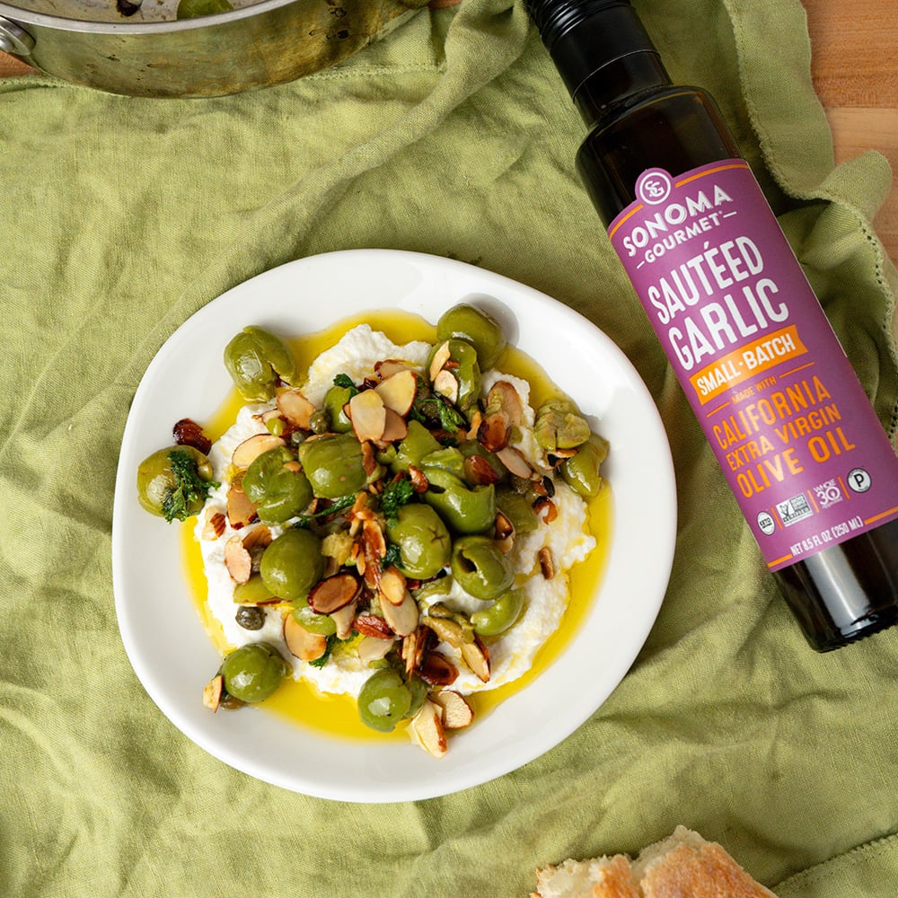 Sautéed garlic ricotta w/ crushed olives, almonds & lemon made with Sonoma Gourmet's sauteed garlic olive oil