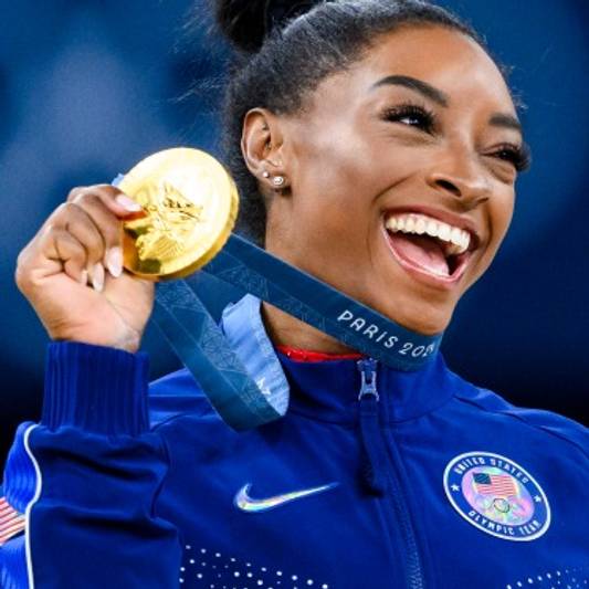 Simone Biles with the 2024 Olympic Gold Medal for vault 