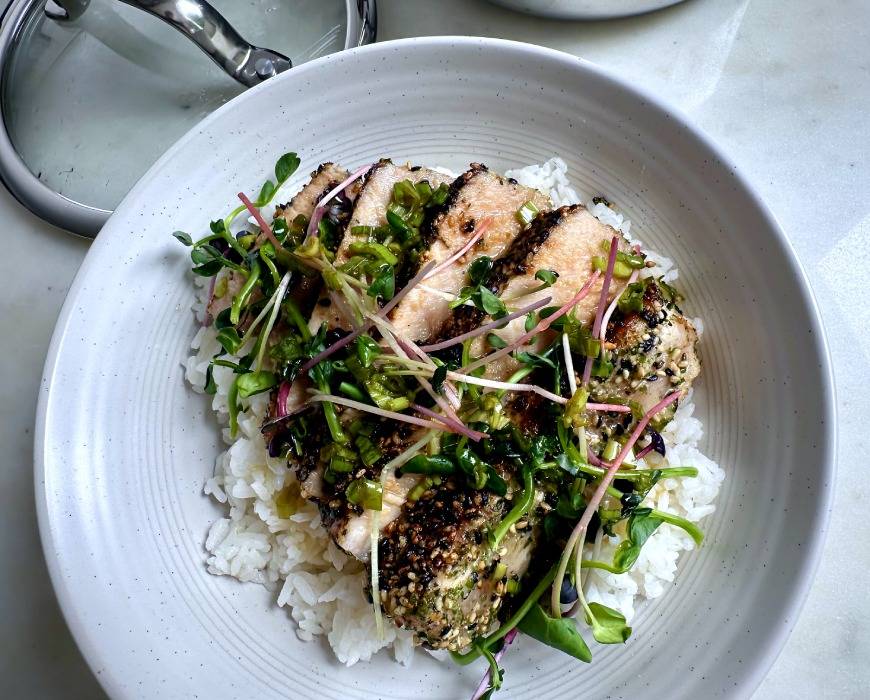 Furikake crusted tuna steak on a bed of white rice