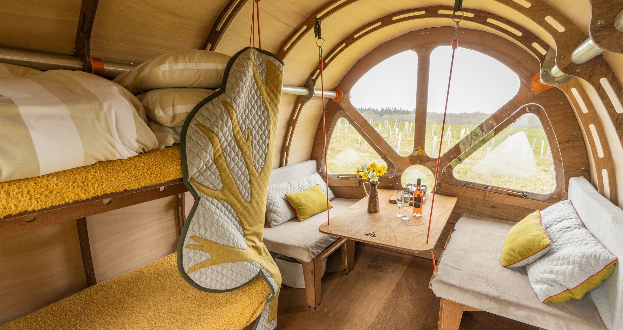 Birdhouse tiny cabin interior with yellow accents