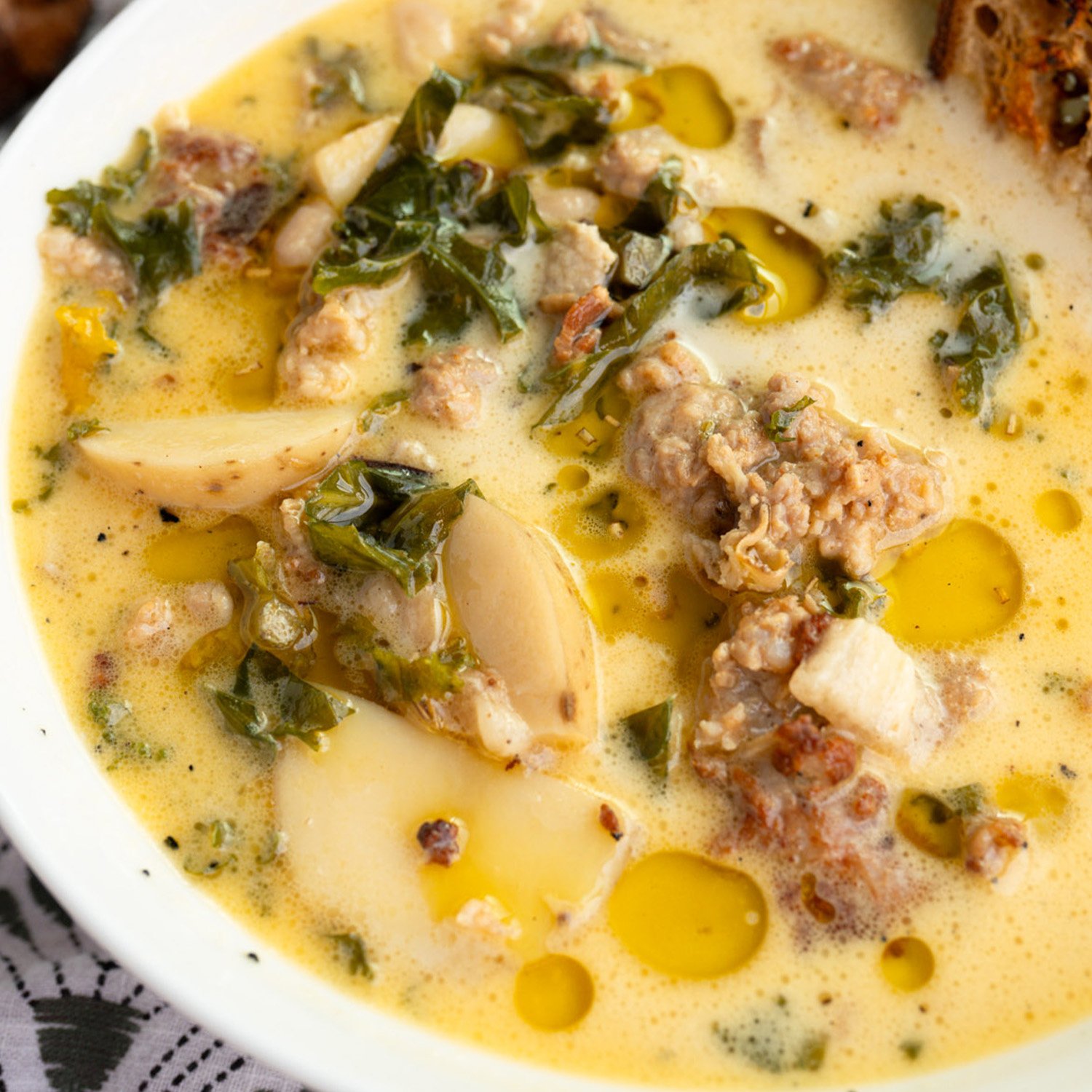Sausage, kale & potato garlicky soup made with Sonoma Gourmet's garlic herbs olive oil
