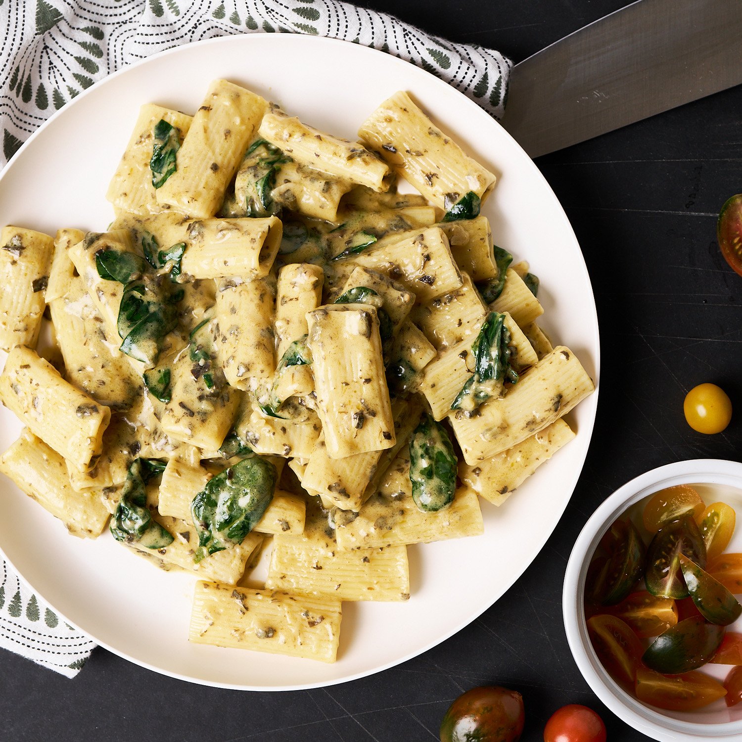 Creamy spinach alfredo rigatone made with Sonoma Gourmet's spinach alfredo sauce