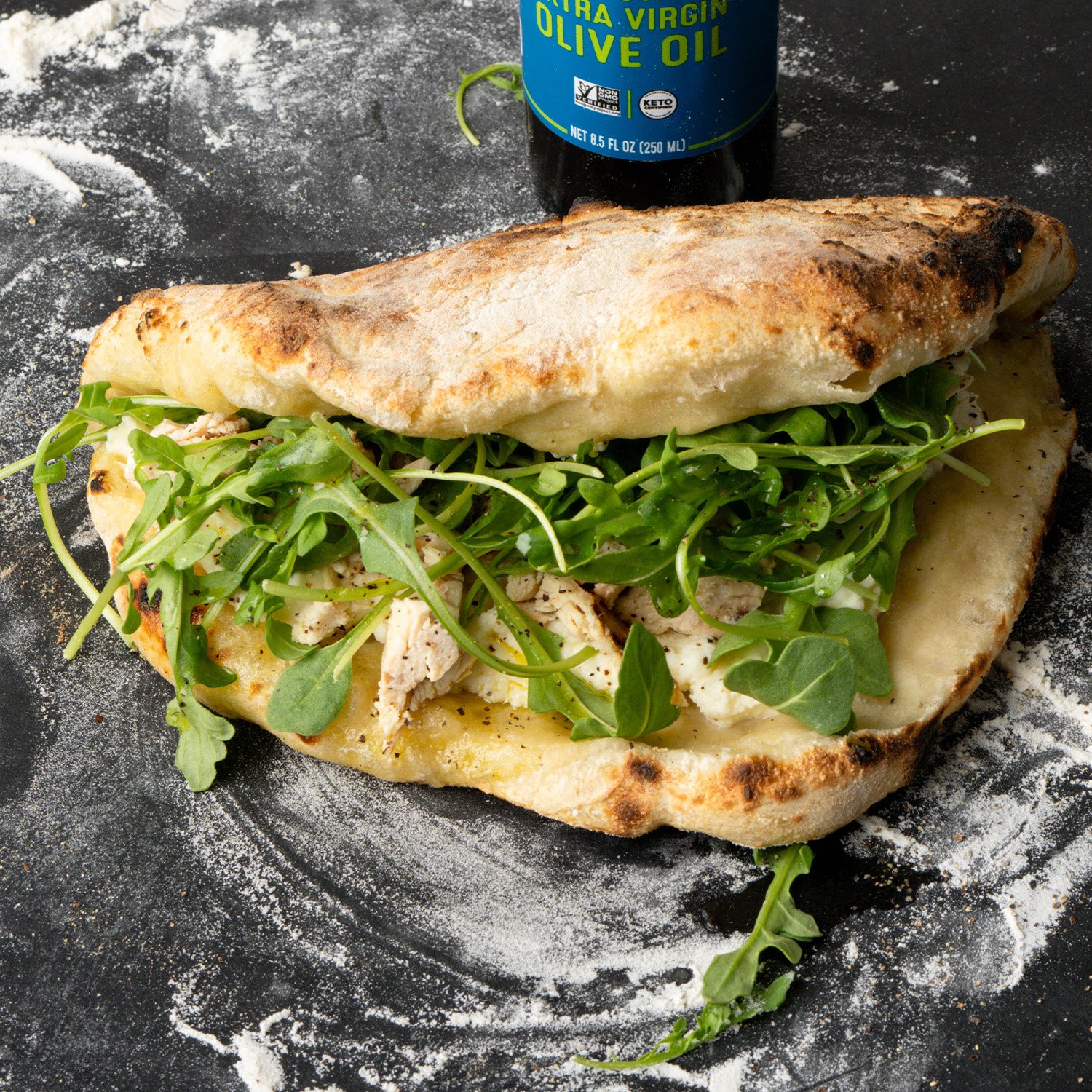 Chicken ricotta mortazza sandwich made with Sonoma Gourmet's basil parmesan olive oil