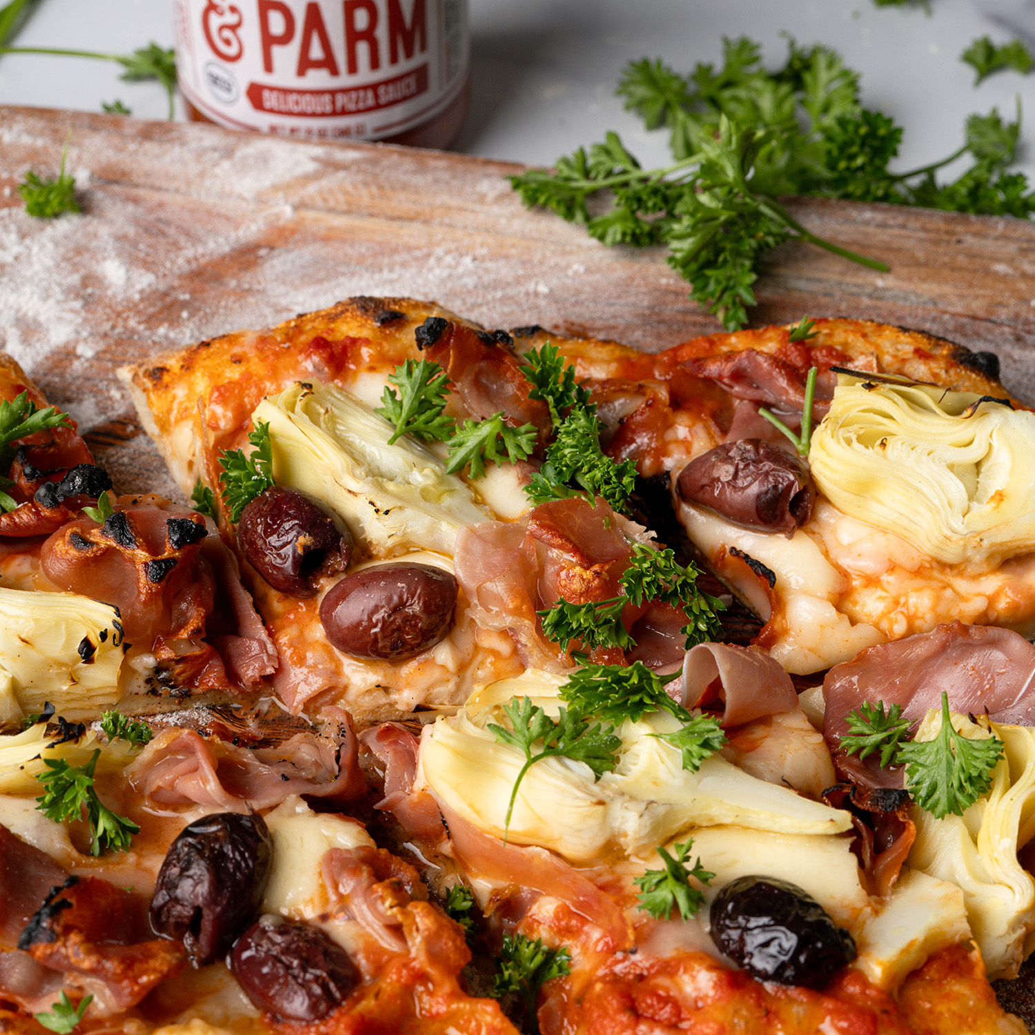 The artichoke affair pizza made with Sonoma Gourmet's tomato parm pizza sauce