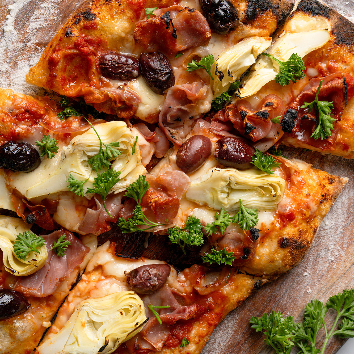 The artichoke affair pizza made with Sonoma Gourmet's tomato parm pizza sauce