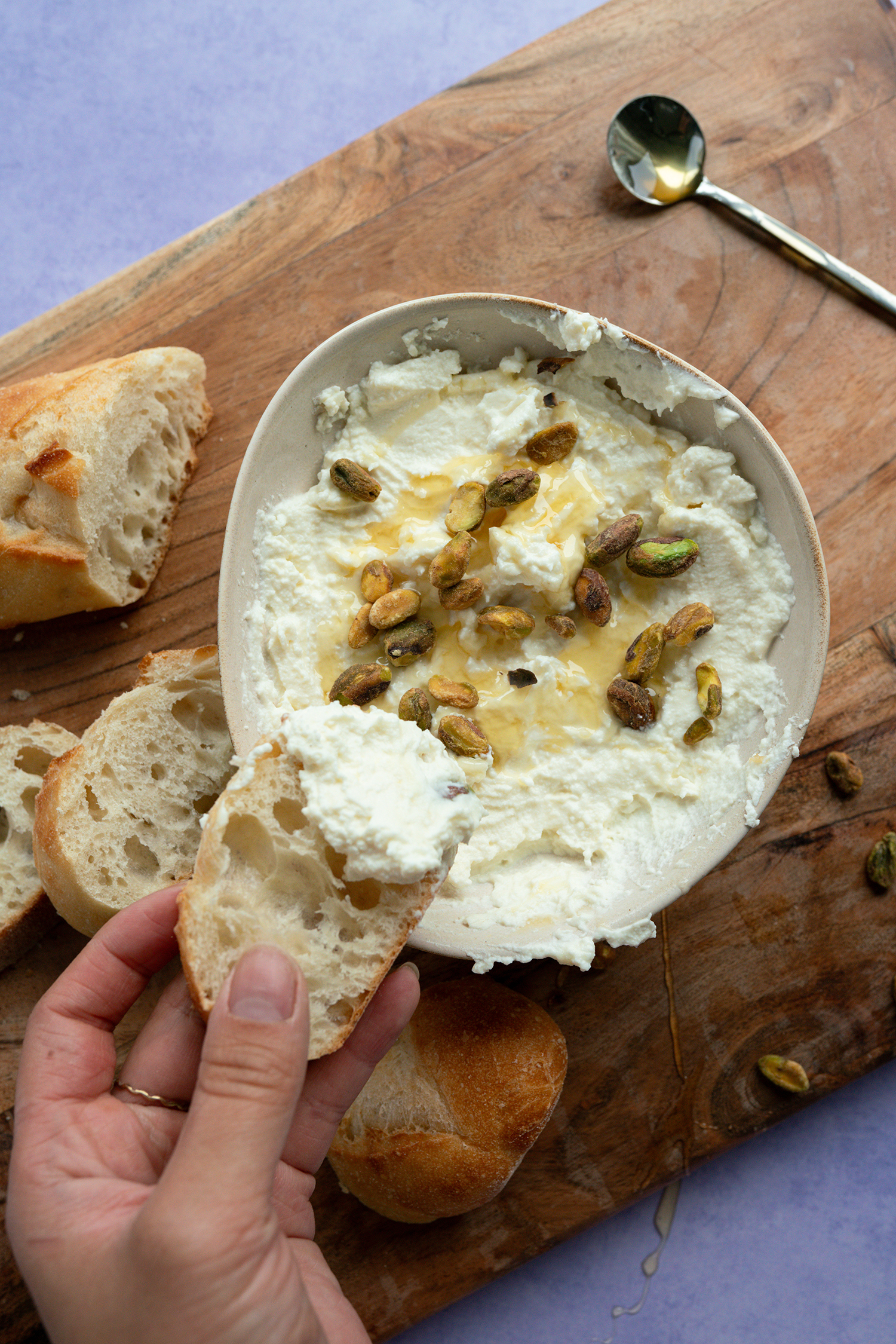 Whipped feta with honey & pistachios made with Sonoma Gourmet's garlic herbs olive oil