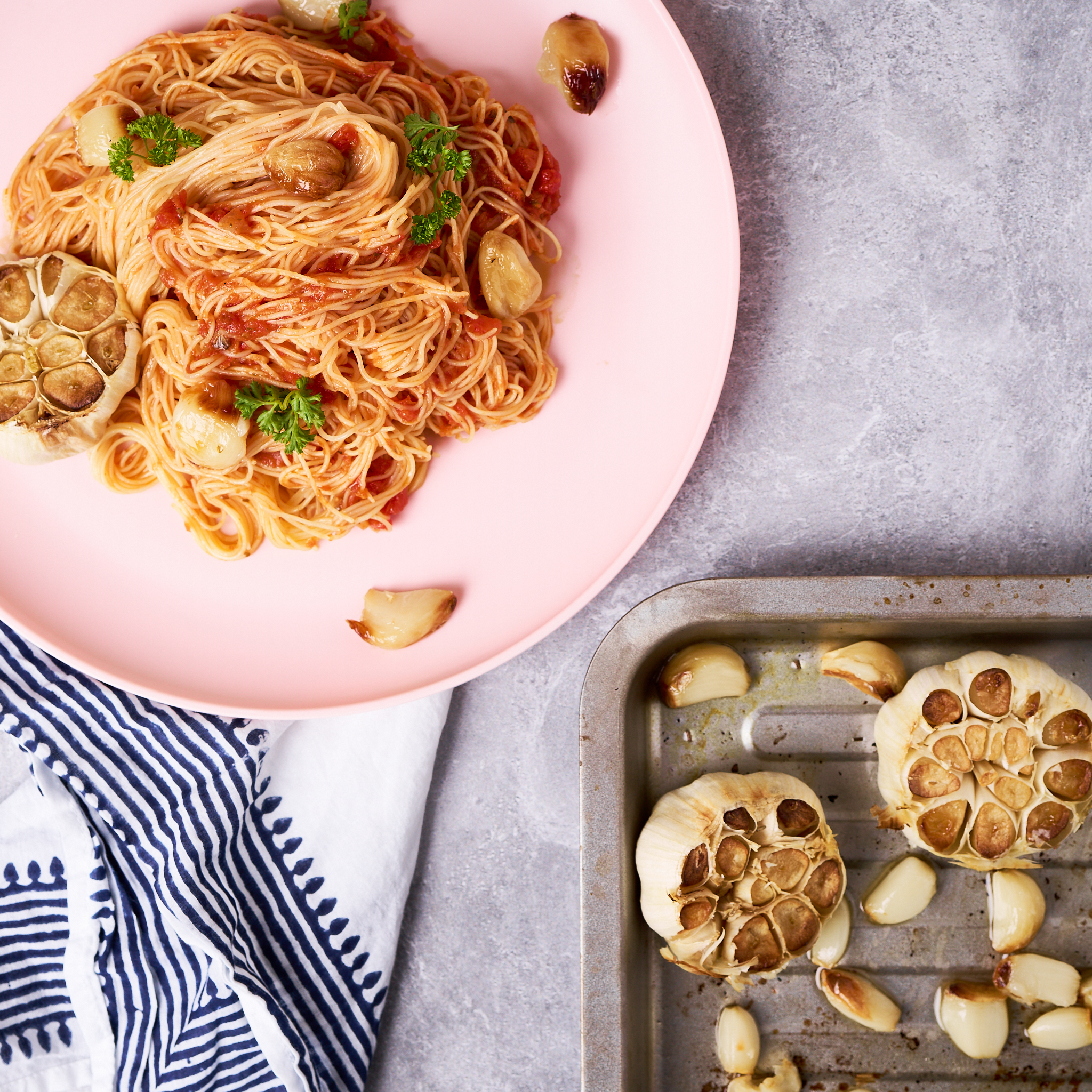 Roasted garlic angel hair pasta made with Sonoma Gourmet's roasted garlic sauce and proof 100 california extra virgin olive oil