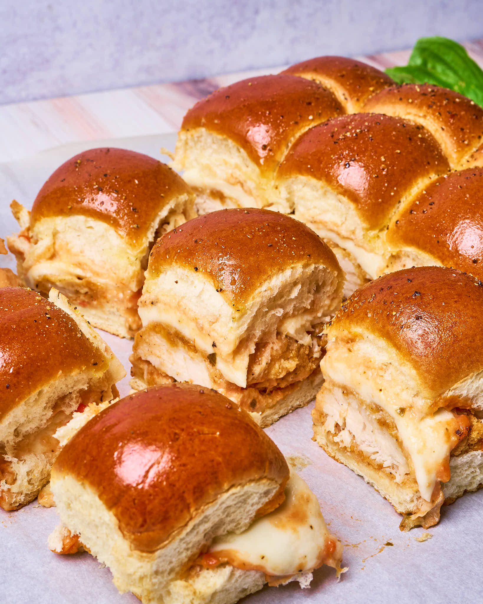 Fried chicken parm sliders made with Sonoma Gourmet's creamy tomato parmesan