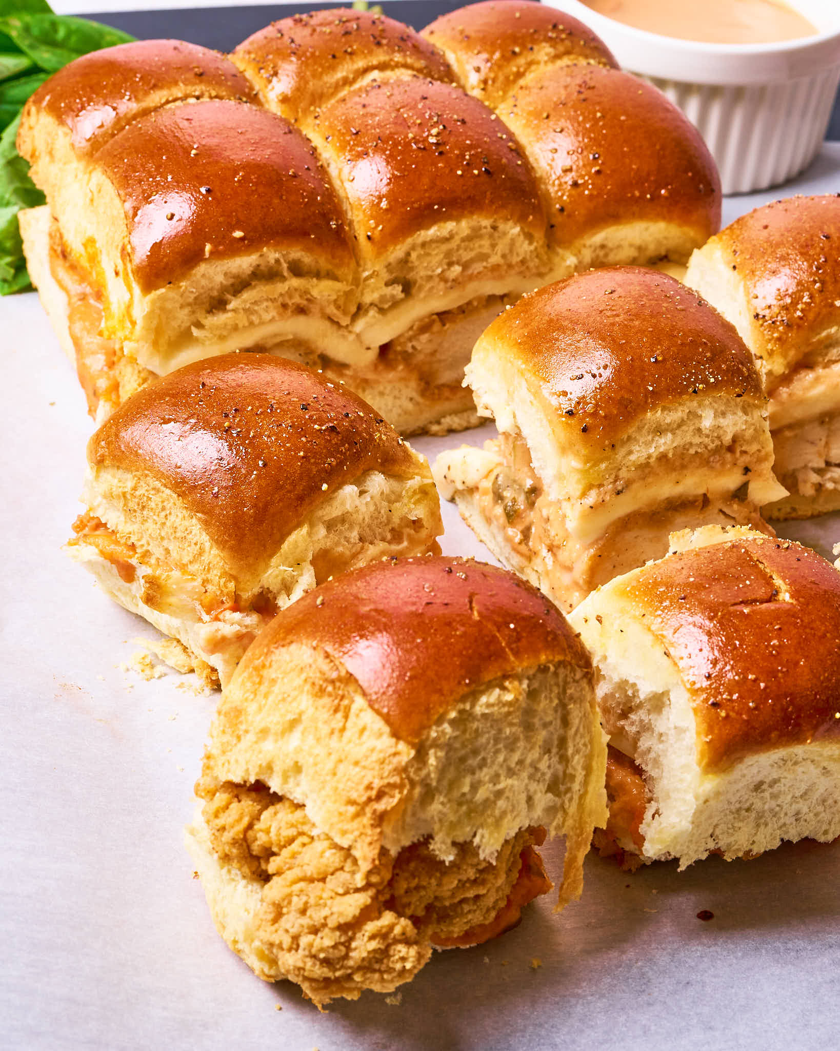 Fried chicken parm sliders made with Sonoma Gourmet's creamy tomato parmesan