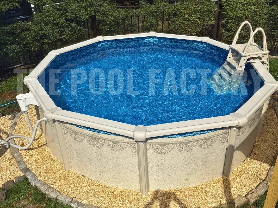 Round pool with grass & rock border and A-Frame safety ladder