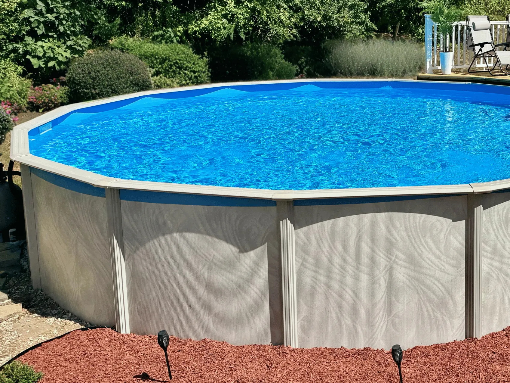 Blue round overlap pool liner in a Bristol round pool
