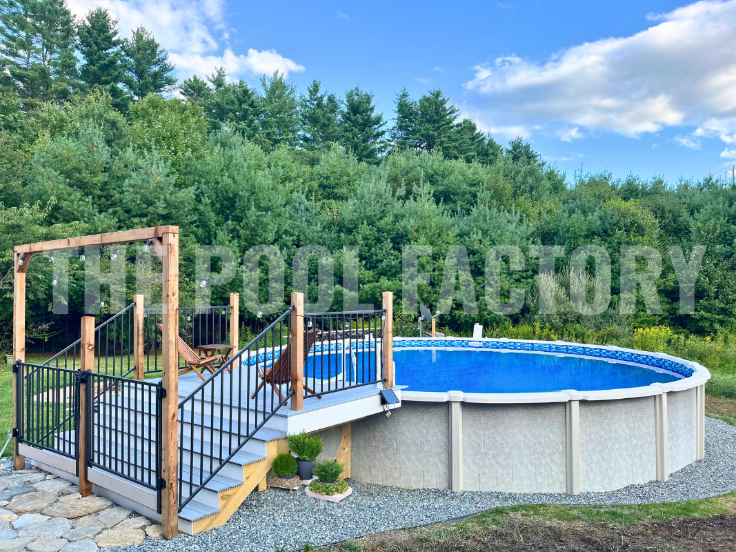 Round saltwater above ground pool with partial deck and forest backdrop