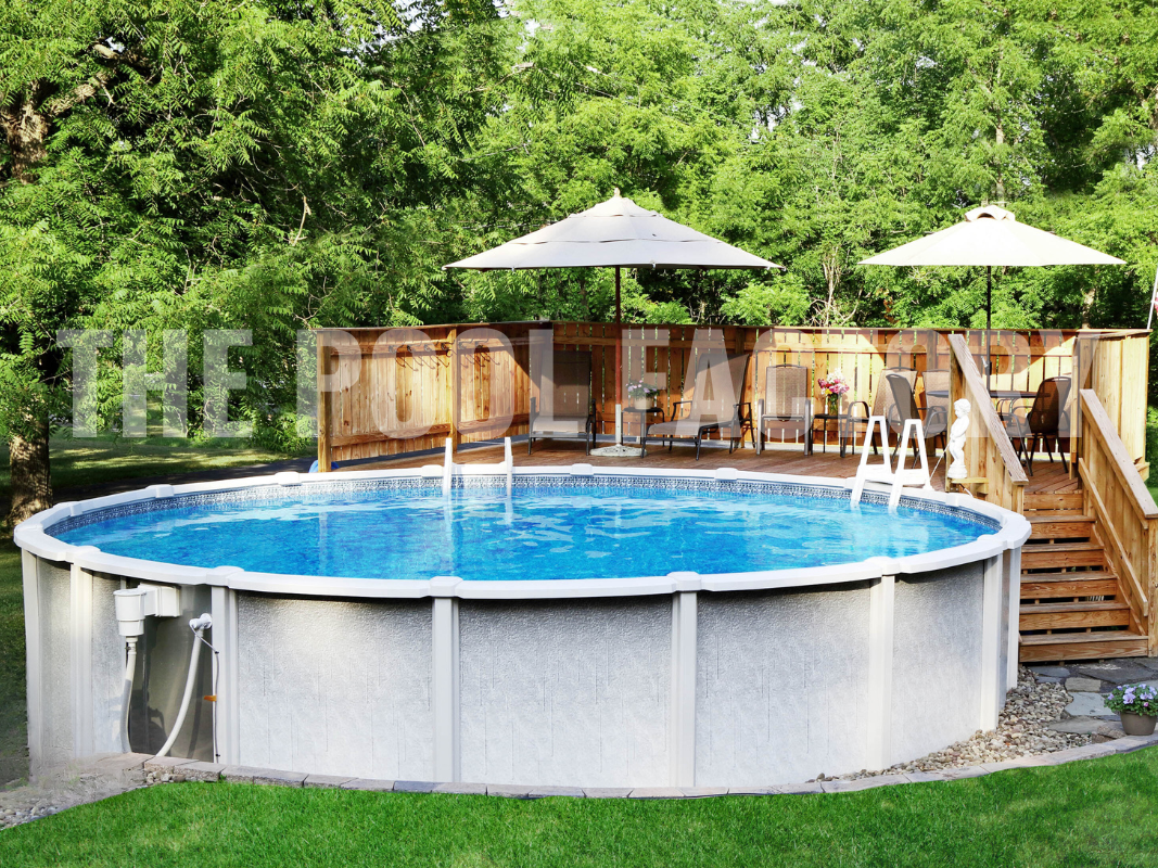Above ground round saltwater pool with partial deck and comfy lounge chairs with umbrellas