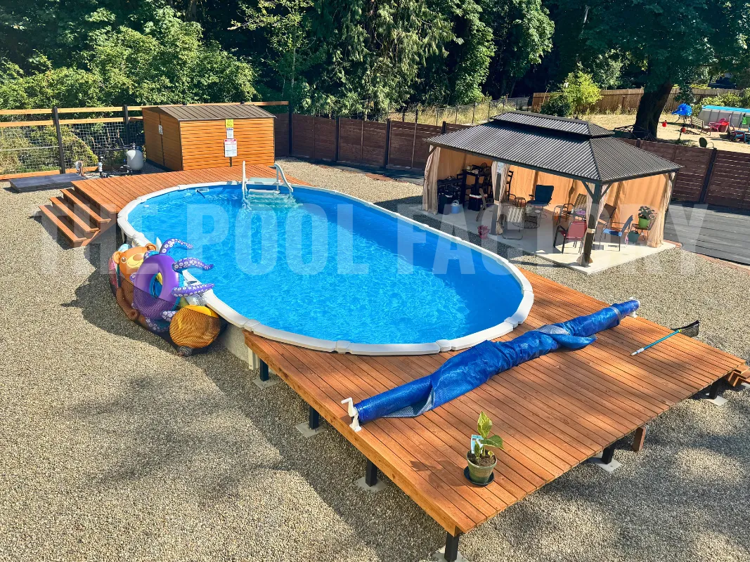 Family backyard with oval saltwater pool, gazebo, and partial deck