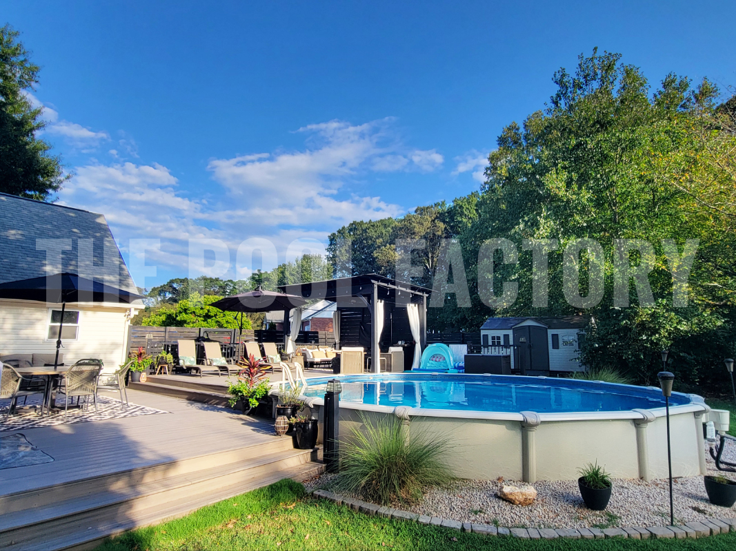 Semi inground round saltwater pool with multi level deck, gazebo and lounge chairs