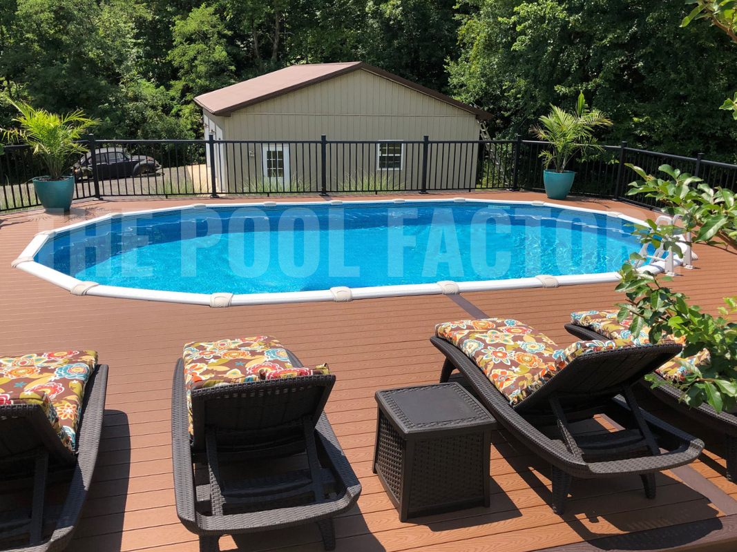 Backyard with oval above-ground saltwater swimming pool and poolside lounge chairs