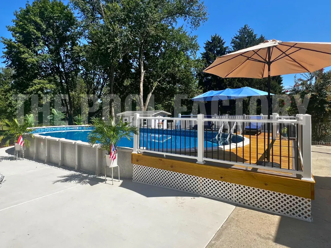 Family backyard with oval saltwater pool and partial deck with seating area and umbrella