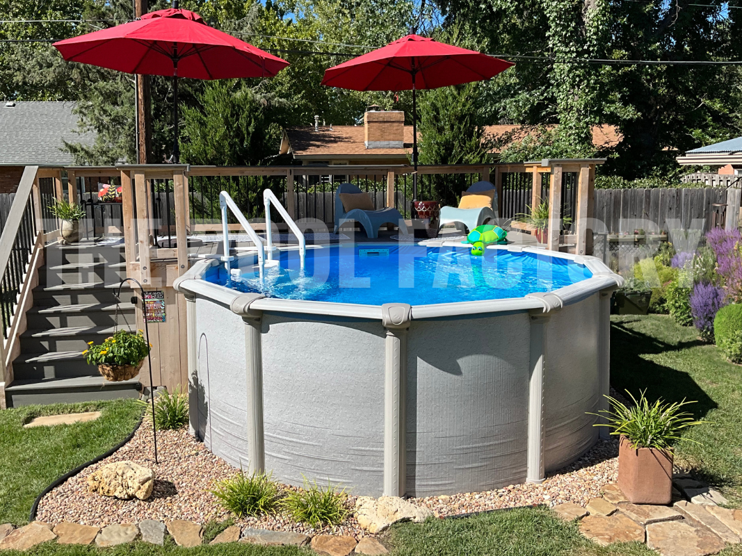 Backyard round swimming pool with umbrellas and sun loungers