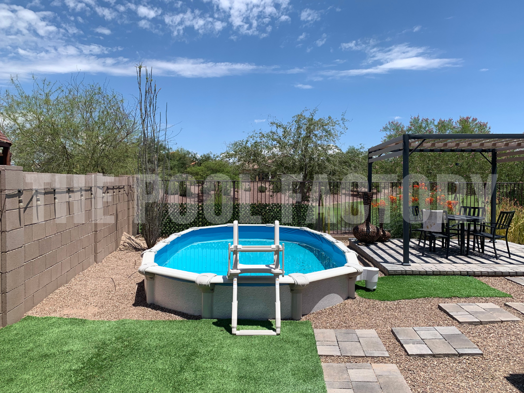 Oval semi inground pool with stone wall and gazebo with outdoor seating