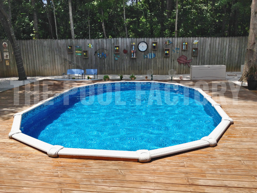 Oval semi inground with wrap around deck and wooden privacy fence