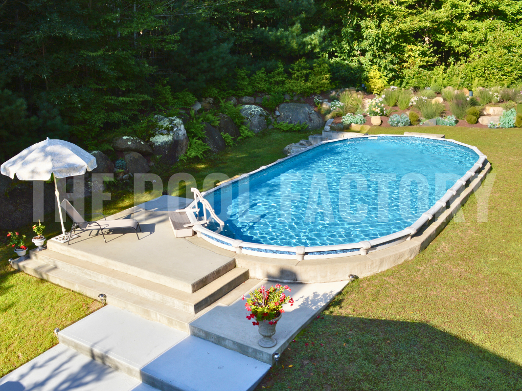 Oval semi inground pool with concrete deck patio and luscious plants and flowers