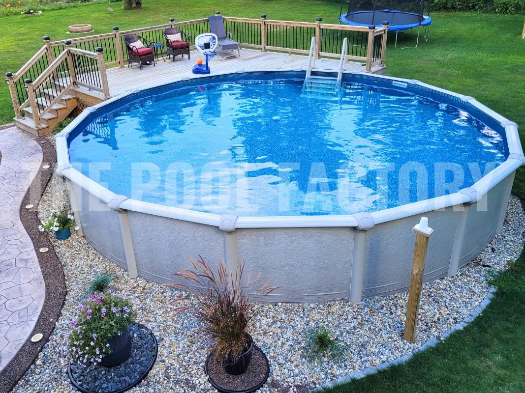 Round above ground swimming pool with deck access and basketball setup