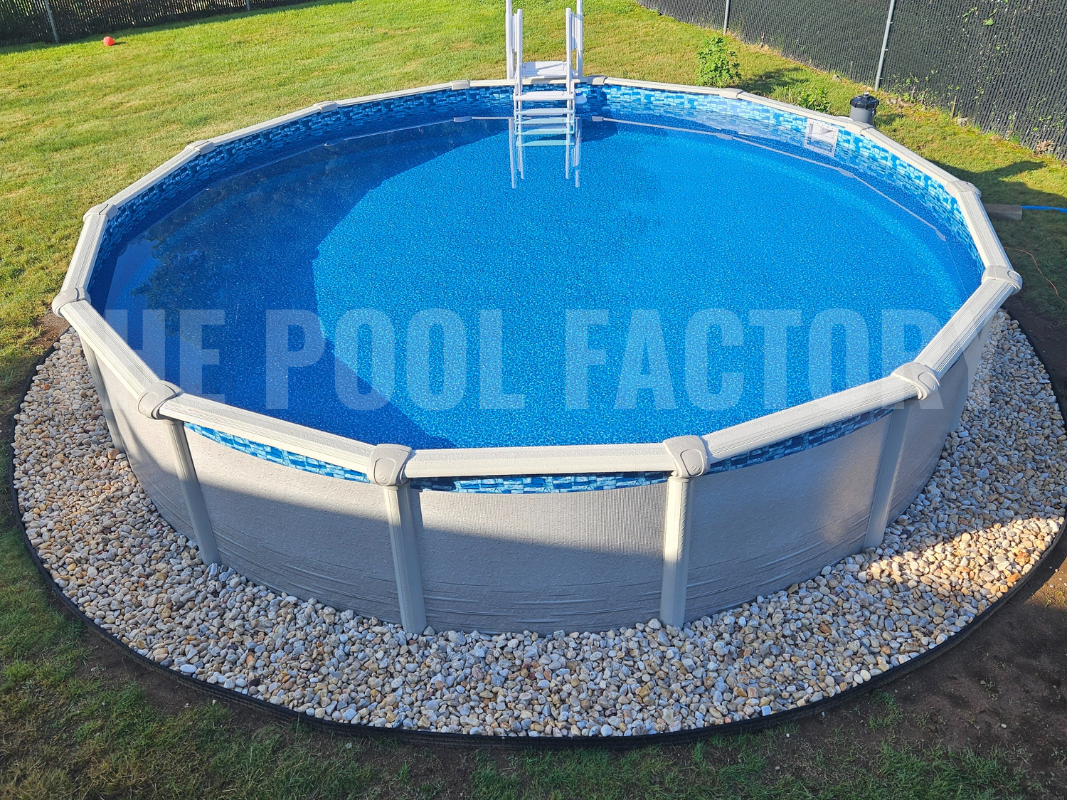 Round above ground swimming pool with decorative stone surrounding