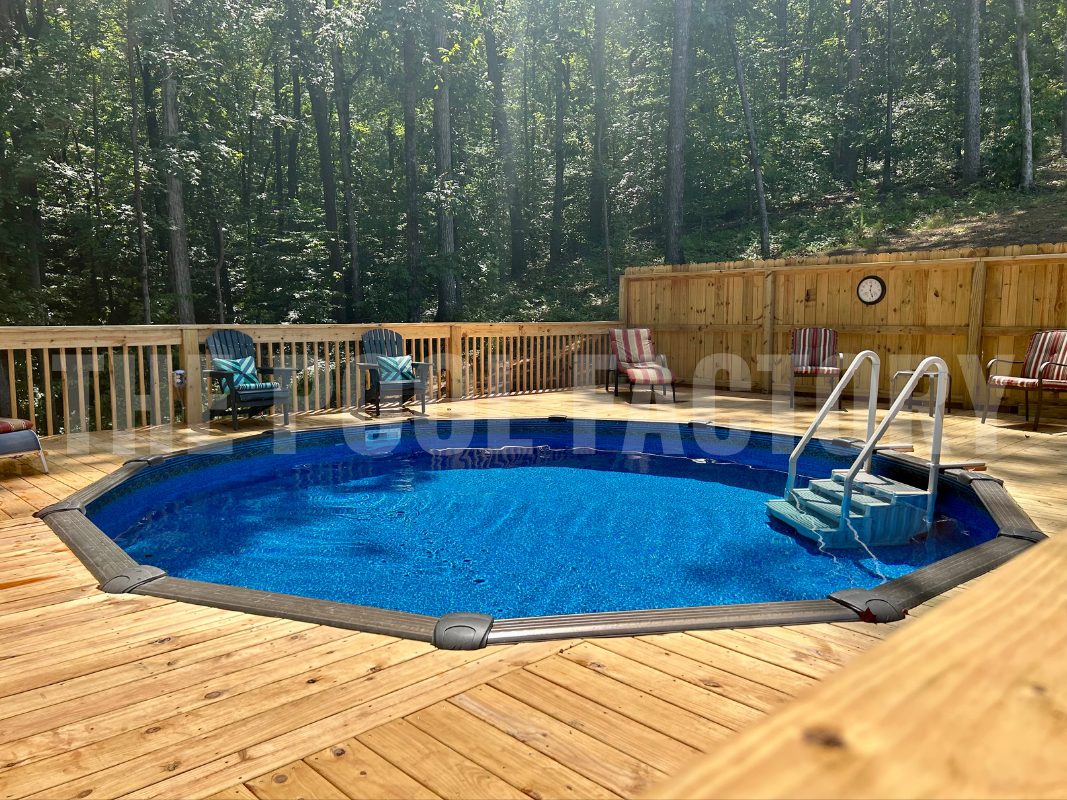 Round above-ground pool with deck and lounge chairs
