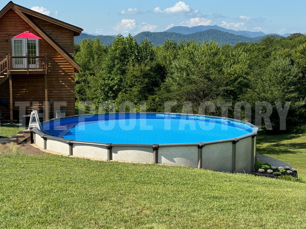 Round above ground swimming pool with forest view and sunny landscaping