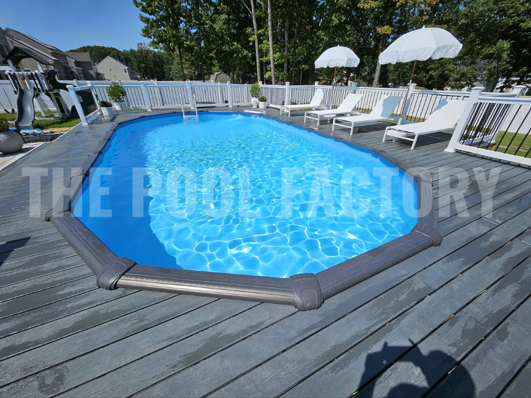 Backyard with oval swimming pool and comfortable poolside chairs