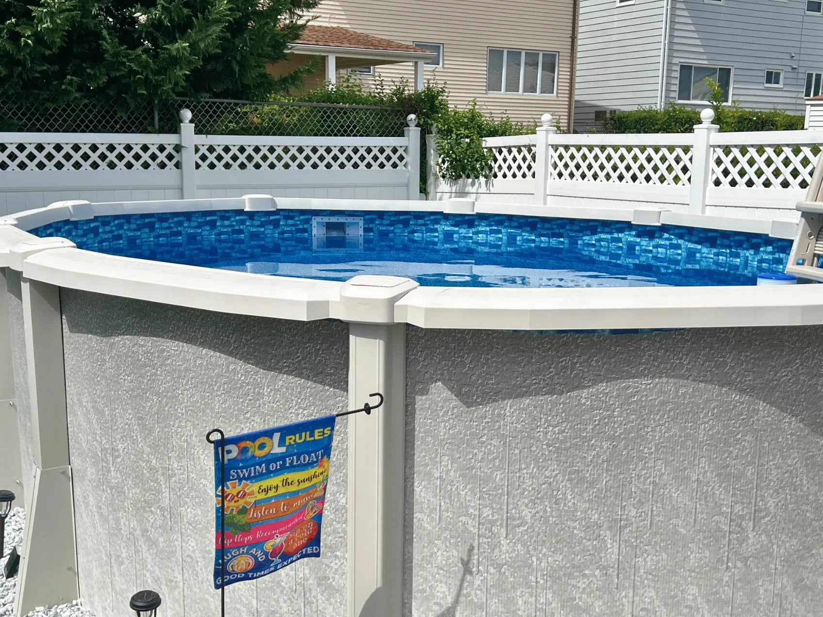 Bluestone oval overlap pool liner in a Saltwater 8000 oval pool
