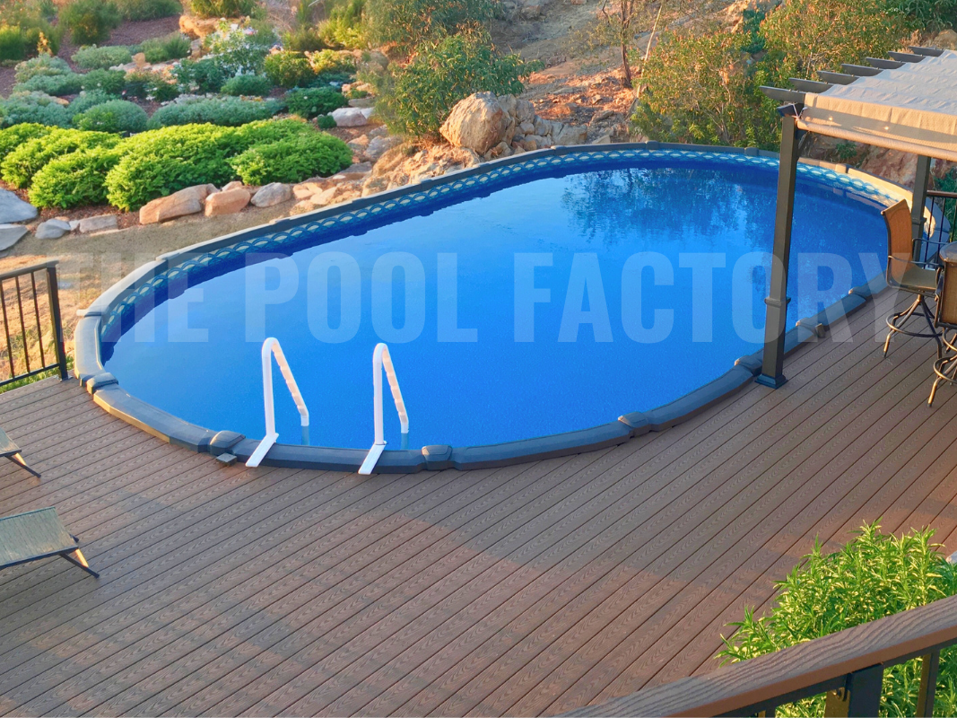 Above ground saltwater pool with deck, gazebo and luscious landscaping 