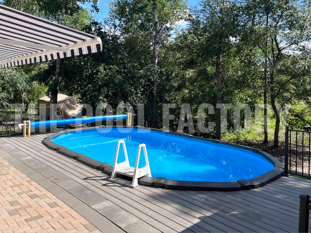 Above ground swimming pool with deck on a sunny day
