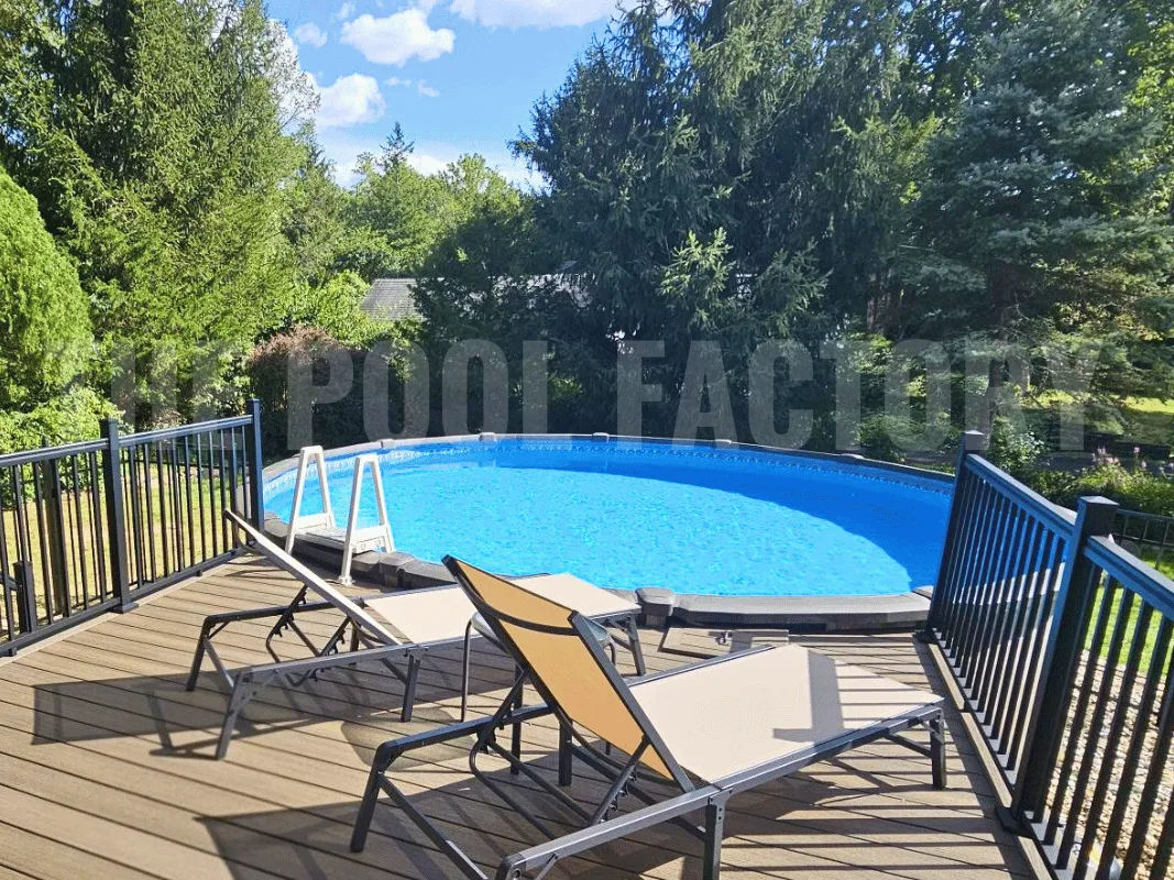 Round above-ground pool with partial deck, in-pool steps, and outdoor lounge chairs