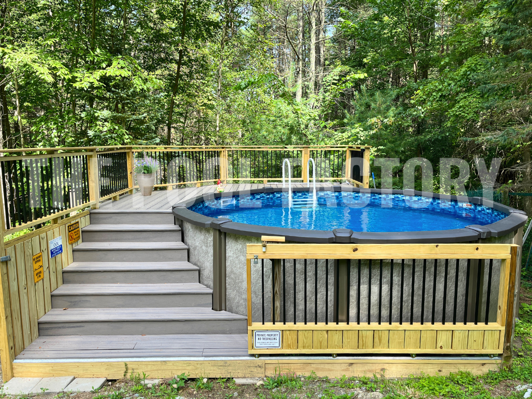 Round above ground swimming pool with safety gate and partial deck