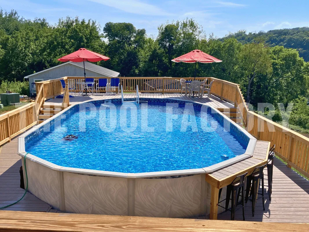 Oval above ground pool with full deck, counter space, and seating area